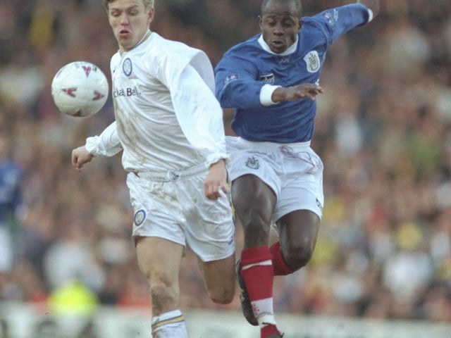 Leeds' Gunner Halle is challenged by Paul Hall at Elland Road as Pompey claim a 3-2 win in the FA Cup Fifth Round in February 1997. Picture: Anton Want/Allsport