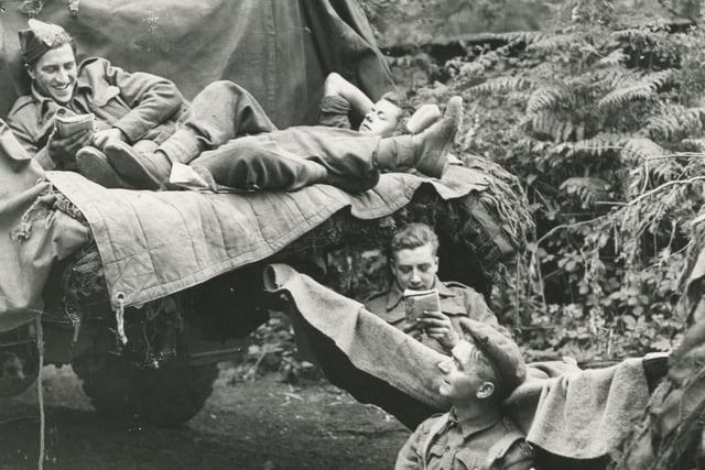 Waiting for the order to move out from the invasion assembly camp
(c) The News, War Series 2891