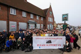 Campaigners outside the Manor House pub, Drayton, where they objected to owners Greene King's closure of the community hub in November. Picture: Chris Moorhouse