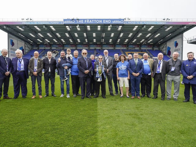 Members of the Portsmouth Supporters' Trust were welcomed onto the Fratton Park pitch to mark the 10-year anniversary of when since fans clubbed together to save the club from liquidation.