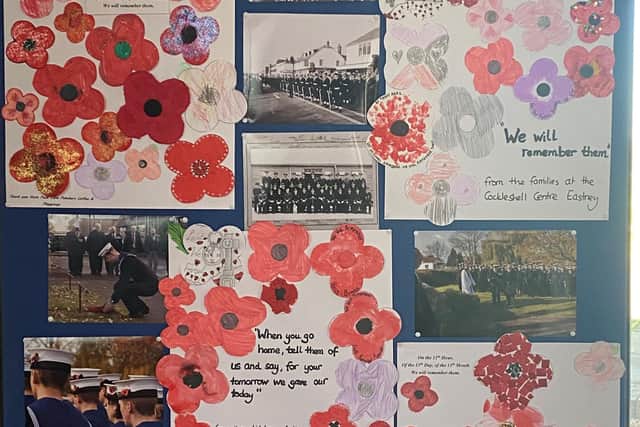 The 'We Will Remember Them' display produced by children from naval families.