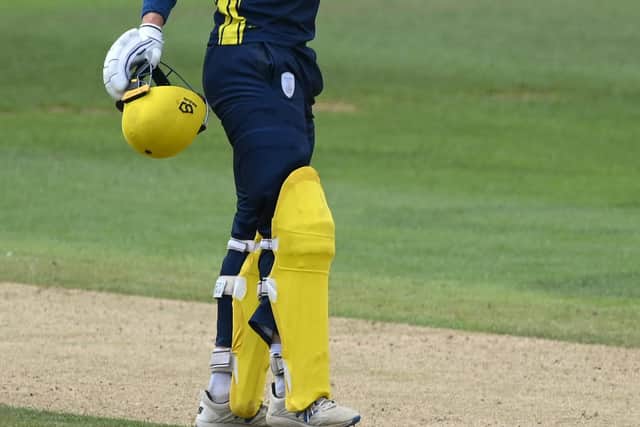 Nick Gubbins celebrates reaching his century during the Royal London Cup tie against Sussex. Photo by Mike Hewitt/Getty Images.