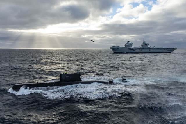 HMS Queen Elizabeth carried out an intense training exercise alongside the Norwegian submarine HNoMS Utstein. Picture: Royal Navy.