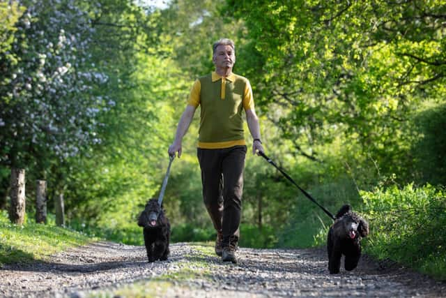 Chris walking with Sid and Nancy