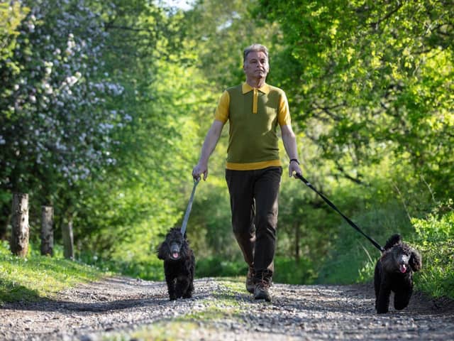 Chris walking with Sid and Nancy