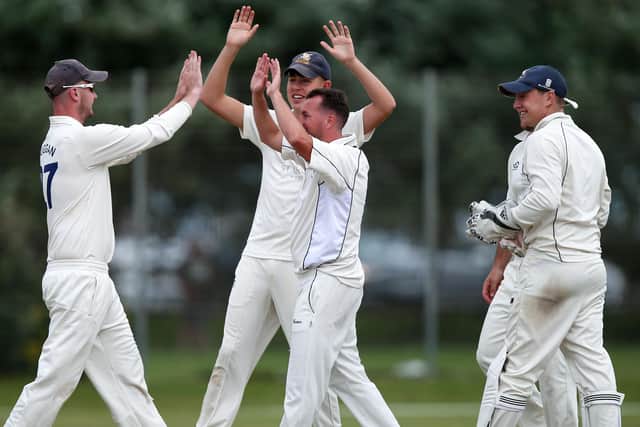 Portsmouth celebrate Ricky Rawlins' wicket. Picture: Chris Moorhouse