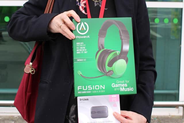 Susan Parish, business and community manager at Park Community School, holding some of the equipment to be given to students. Picture: Emily Turner