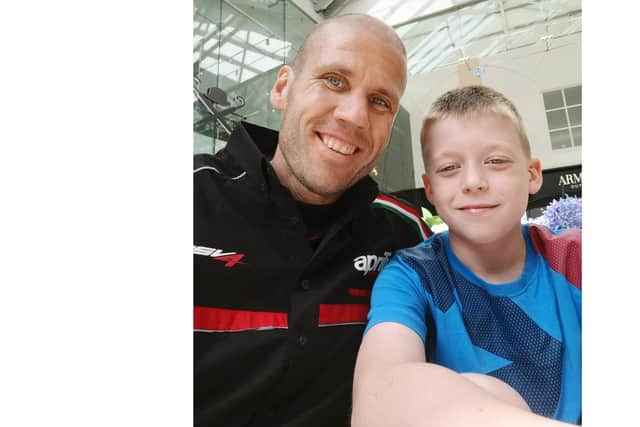 Adam Bignell with his 10-year-old son, Ewan