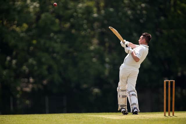 Jamie Nottage hits out for Hayling Island against Portsmouth Community. Picture: Chris Moorhouse
