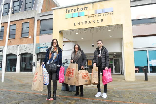 From left, Tracy Slade, 43, Karen Worby, 47, and Kieran Slade, 18, from Gosport. Picture: Sarah Standing (261220-632)