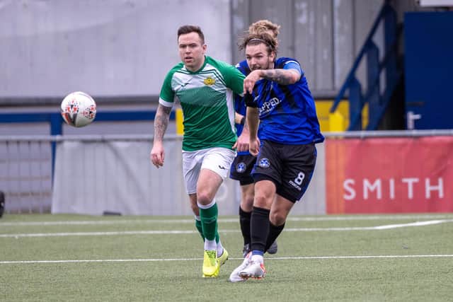 Clanfield's Jake Knight in action against his  former club. Picture: Alex Shute