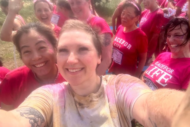 Ellie bumped into her chemotherapy nurses when she was the top fundraiser at Pretty Muddy in 2023.