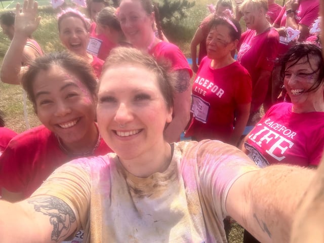Ellie bumped into her chemotherapy nurses when she was the top fundraiser at Pretty Muddy in 2023.