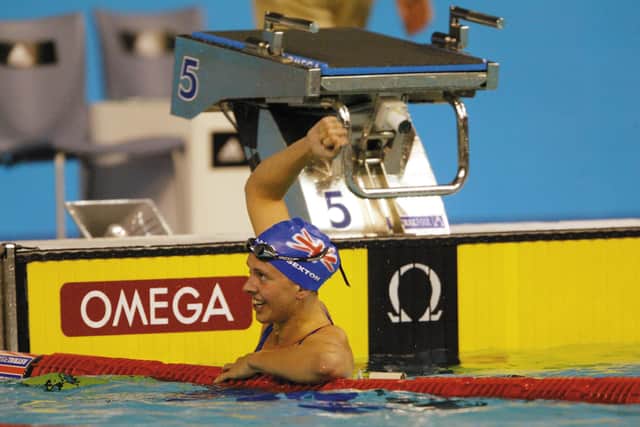 Golden moment - Katy Sexton celebrates after winning gold in the Women's 200m Backstroke Final in 2003. Photo by Shaun Botterill/Getty Images.