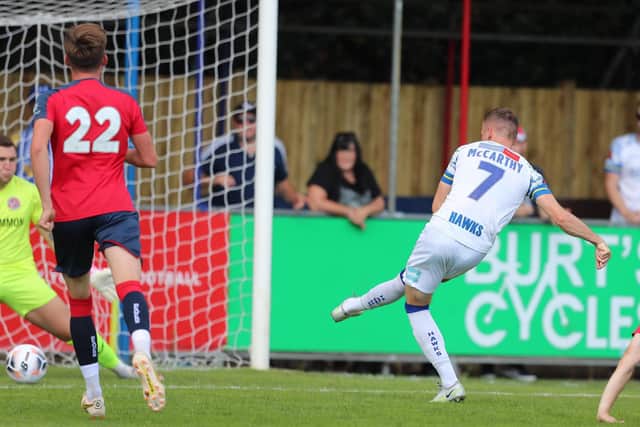 Jake McCarthy puts Hawks in front at Hampton & Richmond. Picture by Dave Haines