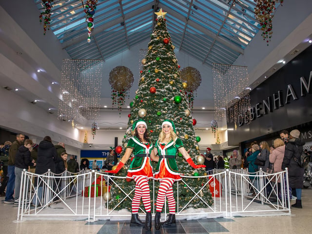 The crowds braved the wind and rain to watch the Christmas lights being switched on in Fareham highstreet on Saturday evening, while some of the entertainment was moved into the shopping centre.
Pictured - Jenna and Natasha as Christmas Elves
Photos by Alex Shute