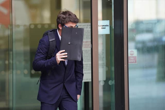 Daniel Brydges, of Portsmouth, covering his face as he leaves Westminster Magistrates' Court. He was spared jail after admitting to trespassing on Buckingham Palace grounds. Picture: James Manning/PA Wire.