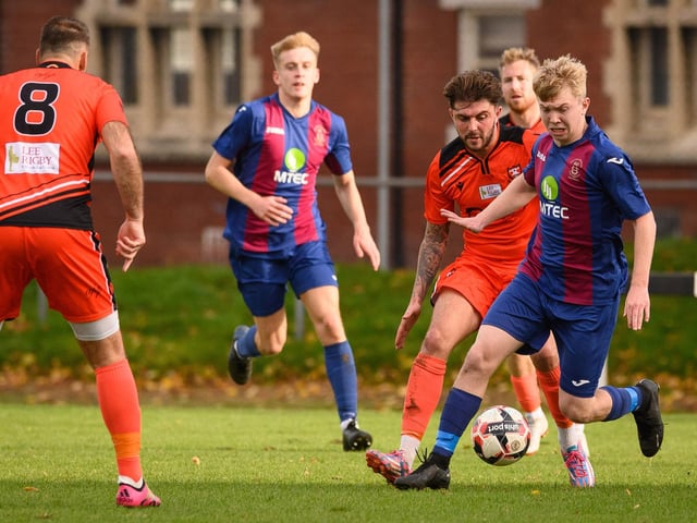 USP's Vinny McGee and Portchester's James Cowan. Picture: Keith Woodland