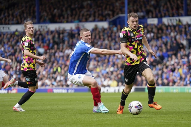 Colby Bishop puts pressure on the Carlisle defence.