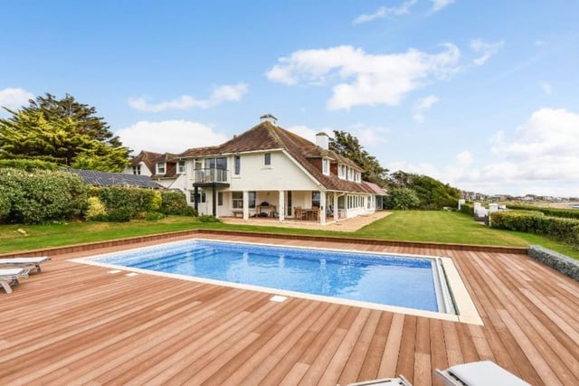 This property comes with six bedrooms, four bathrooms and five reception rooms as well as a heated pool, a gym and a large decked area. This home is on the market for offers over £3,000,000 and it is being sold with Jeffries & Dibbens Estate Agents. The listing says: "Comprising of approximately 7160 square feet, this impressive family home is situated on Hill Head Seafront and boasts panoramic views across the Solent to the Isle of Wight." For more information about the property, visit Zoopla.