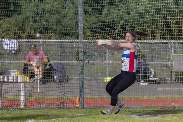 Cerys Thomas broke the Championship record in winning the senior women's hammer. Picture: Paul Smith