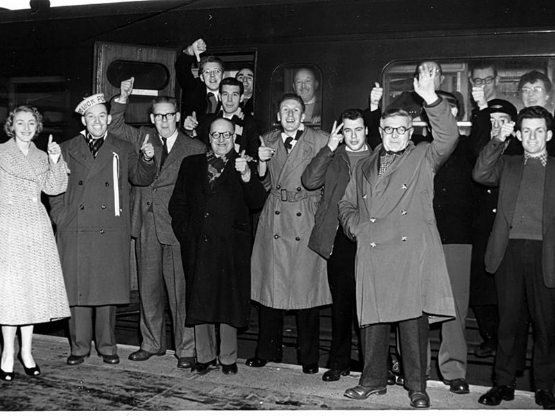 Seen in late, late 1950's we see Pompey supporters boarding a train for Wolverhampton to see Pompey play in an F.A. Cup game.  Wolves won says Mr Jenkins of Purbrook who sent it in. He is in the doorway with the thumb pointing downwards.