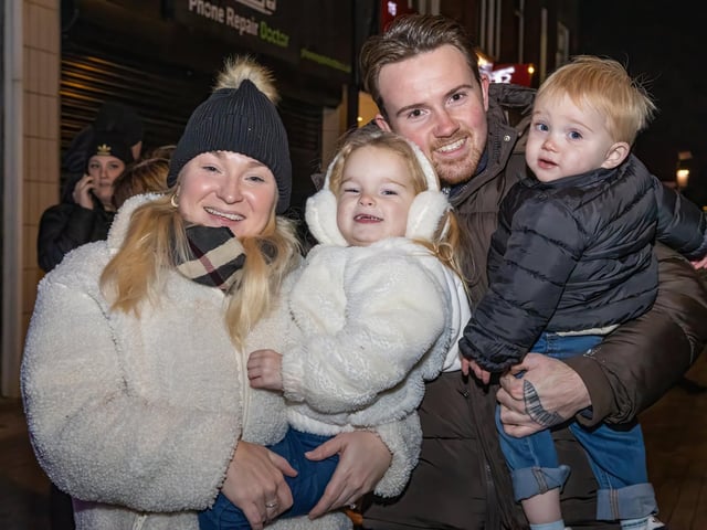 The Moore family from Cowplain enjoy the Waterlooville Christmas light switch on.  Photos by Alex Shute