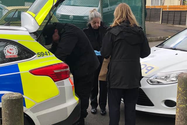 Police bagged up a coat found in Falmouth Road as evidence. Picture: David George