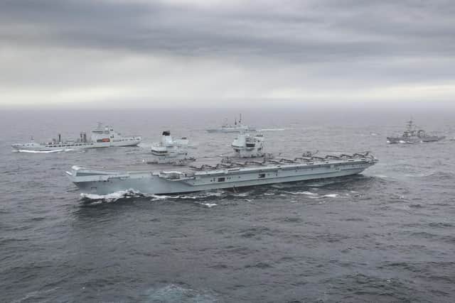 HMS Queen Elizabeth pictured with some of her carrier strike group in 2020. Photo: Royal Navy
