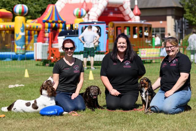 At the 2019 summer festival, the Academy of Modern Canine Behaviour and Training (L-R) Orla Waugh with Daisy, Kim Walkley with Nessy and Juliet Andrews with Fudge. Picture: Duncan Shepherd