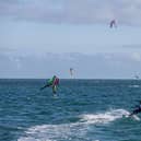 Kitesurfing Armada Festival at Hayling Island in 2021. Pictured: People kite surfing at Hayling Island. Picture: Habibur Rahman.
