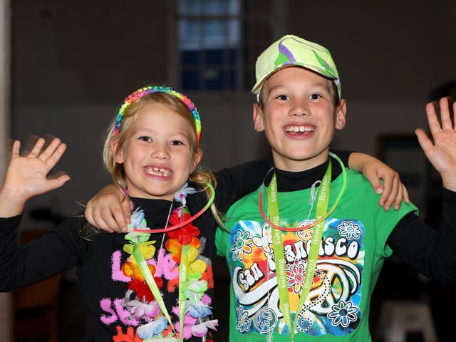 Phoebe March, 7, and Henry March, 9. Starlit Walk in aid of Rowans Hospice, Portsmouth Historic Dockyard, HM Naval Base PortsmouthPicture: Chris Moorhouse (jpns 261023-14)