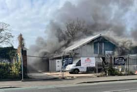 A fire has broken out in Goldsmith Avenue, Southsea in Portsmouth on April 28. Pictured is thick smoke billowing from M&H Auto Services in Goldsmith Avenue. Picture: Nigel McDonald