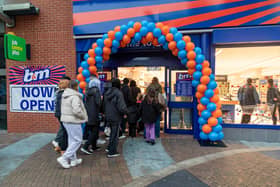 Customers stream into the new B&M store as it opens at 8am. Picture: Mike Cooter (301124)