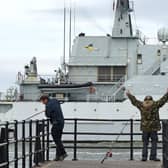 Fishermen in Portsmouth welcome back HMS Severn from her deployment to assist the fishermen of Jersey
Picture: Solent News and Photo Agency