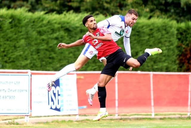 Harvey Bradbury (white) in action at Fareham prior to his dismissal last weekend. Picture by Tom Phillips
