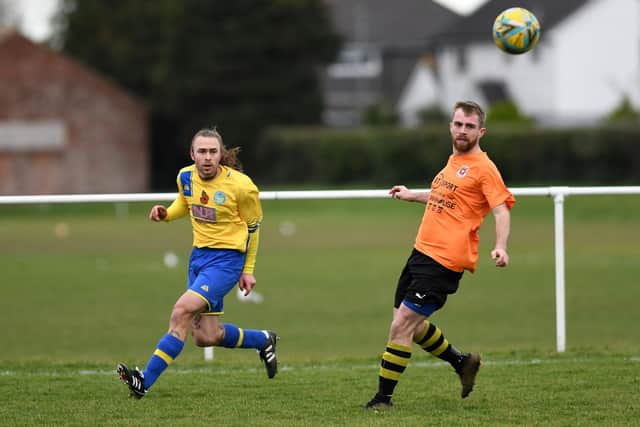 Meon Milton (yellow/blue) v Shanklin. Picture: Neil Marshall