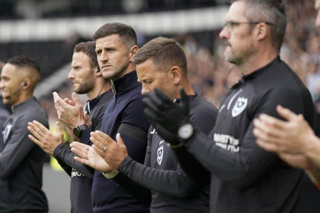 Pompey head coach John Mousinho and his staff against Derby County. Pic: Jason Brown.