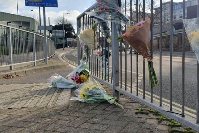 Floral tributes have been left at the site of a fatal collision outside Gunwharf Quays. Picture: Habibur Rahman