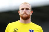 Former Pompey goalkeeper Aaron McCarey was sent off for lashing out at his Glentoran team-mate   picture: Joe Pepler