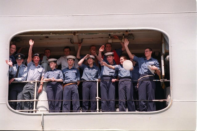 Crew members on HMS Invincible wave to their gathered famillies as the great ship docks in 1999. Picture: Pete Langdown