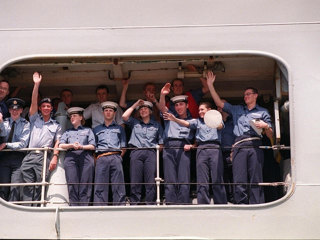 Crew members on HMS Invincible wave to their gathered famillies as the great ship docks in 1999. Picture: Pete Langdown