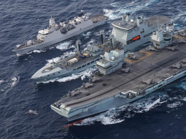 HNLMS Evertsen, RFA Tidespring and HMS Queen Elizabeth to conduct a double replenishment at sea whilst transiting the South China Sea. HMS Queen Elizabeth was able to launch Jets from VMFA-211 whilst conduct a fuel replenishment with RFA Tidespring. Whilst this happened RFA Tidespring also conducted a replenishment with HNLMS Evertsen, this procedure is known as a double RAS.