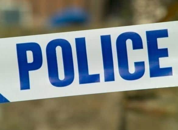 A gang wearing Halloween masks threatened two men with a mallet on Southsea seafront