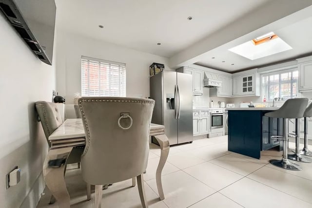 The listing says: "The ground floor of the home consists of an entrance hallway, spacious lounge room, modern four piece bathroom and an open plan kitchen diner across the rear."