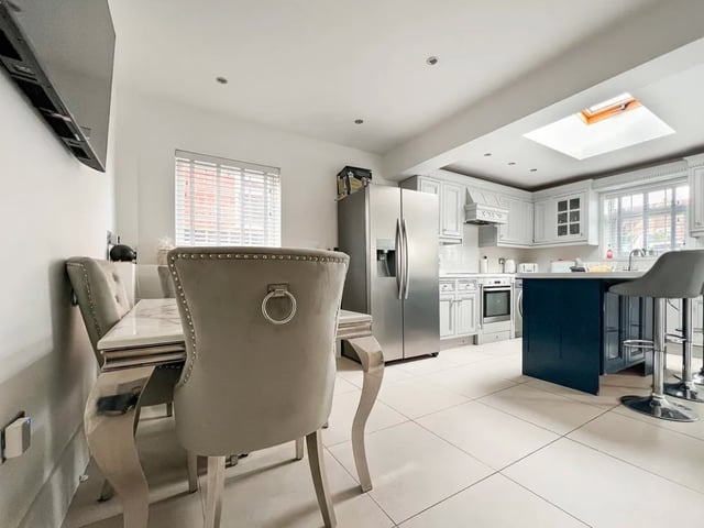 The listing says: "The ground floor of the home consists of an entrance hallway, spacious lounge room, modern four piece bathroom and an open plan kitchen diner across the rear."