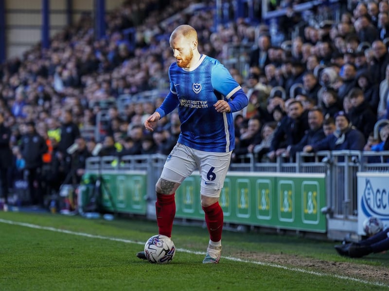 Connor Ogilvie in front of a packed South Stand.