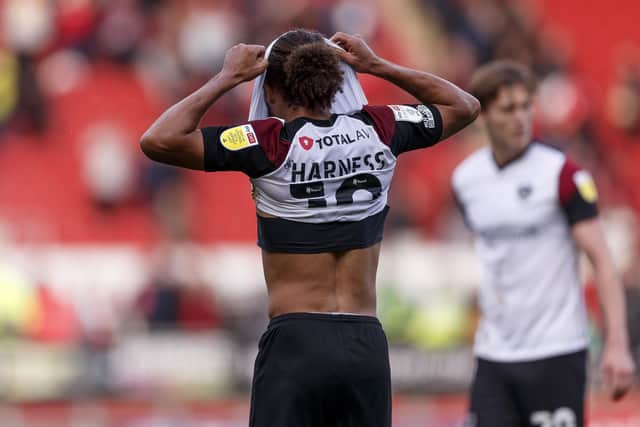 Marcus Harness hides his head at the final whistle.  Picture: Daniel Chesterton