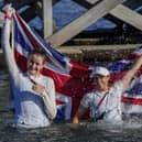 Eilidh Mcintyre, left, and Hannah Mills celebrate after winning the 470 women's gold medal during the 2020 Summer Olympics. Picture: AP Photo/Bernat Armangue
