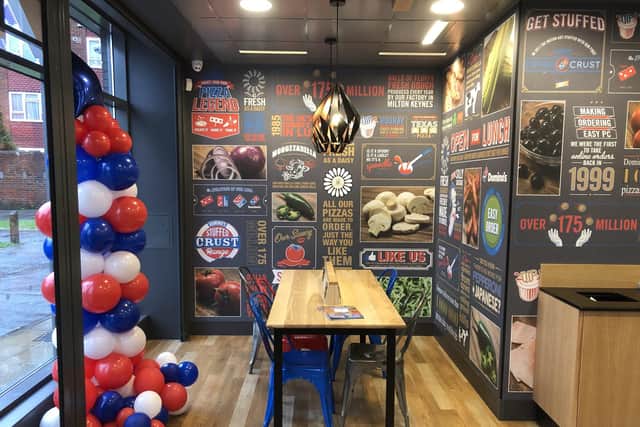 The new Domino's Pizza store that has opened in Winston Churchill Avenue in Portsmouth. It is one of three of the franchise's restaurants that have an option to eat in. It also has plug sockets on the tables to allow students to work and eat.